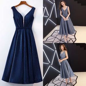 Navy shimmer fabric T length dress low v top dress